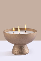 golden metal bowl candle 